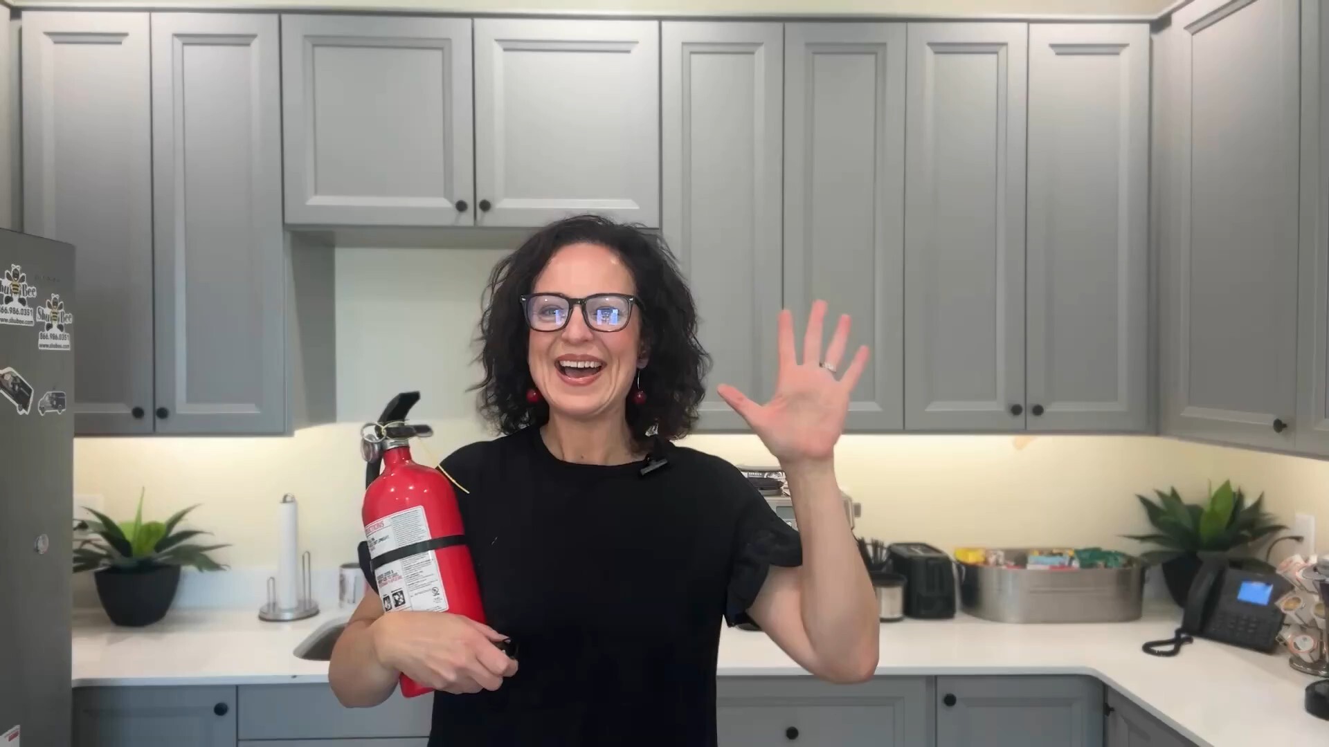jaime with fire extinguisher waving-1