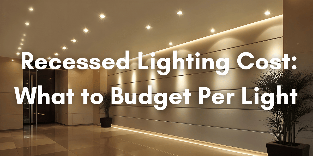 Modern hallway with warm recessed ceiling lights and wall lighting, overlaid with the text “Recessed Lighting Cost: What to Budget Per Light.”